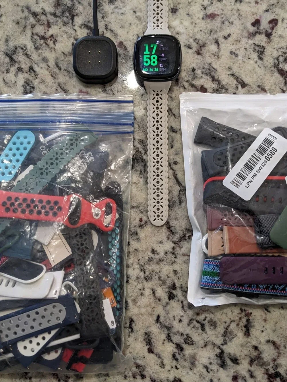 Fitbit Versa 4 Smartwatch & Silicone Band Bundle